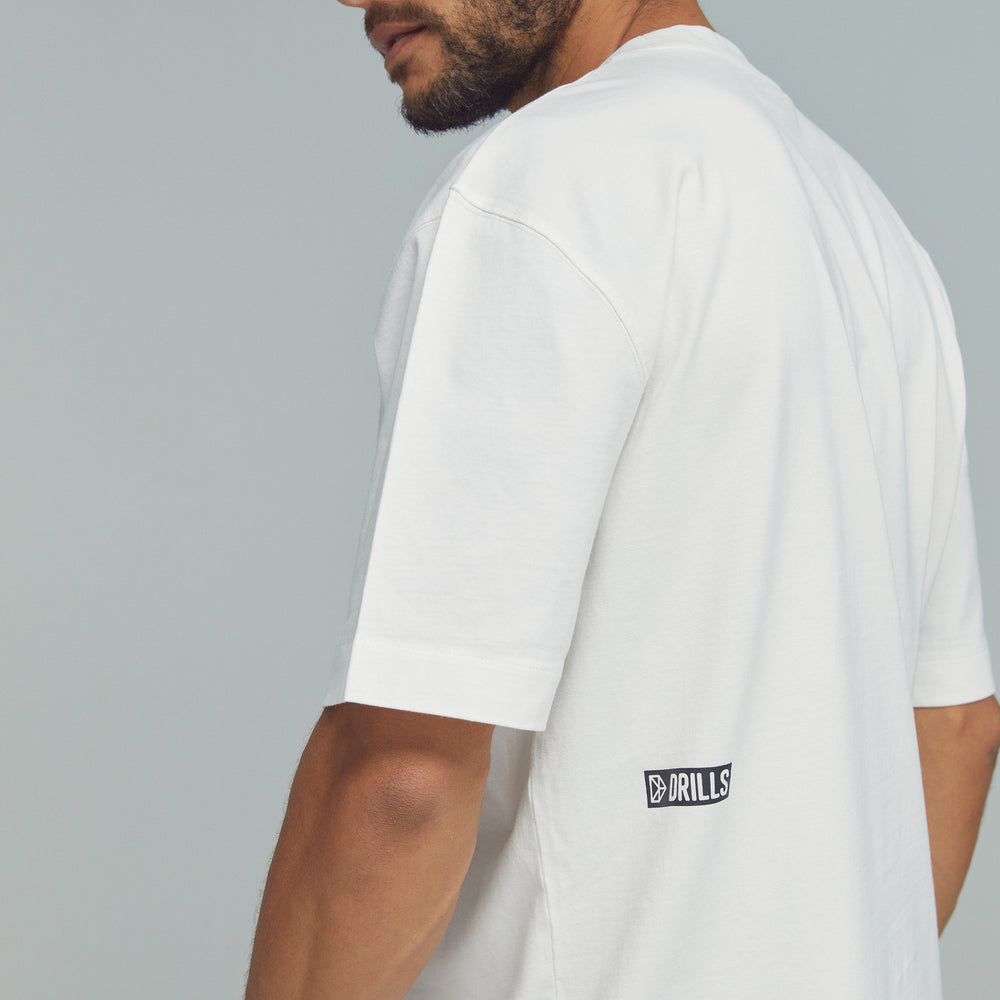 
                      
                        RECREATION DRILLS D-Logo Graphic Tee White/Black
                      
                    