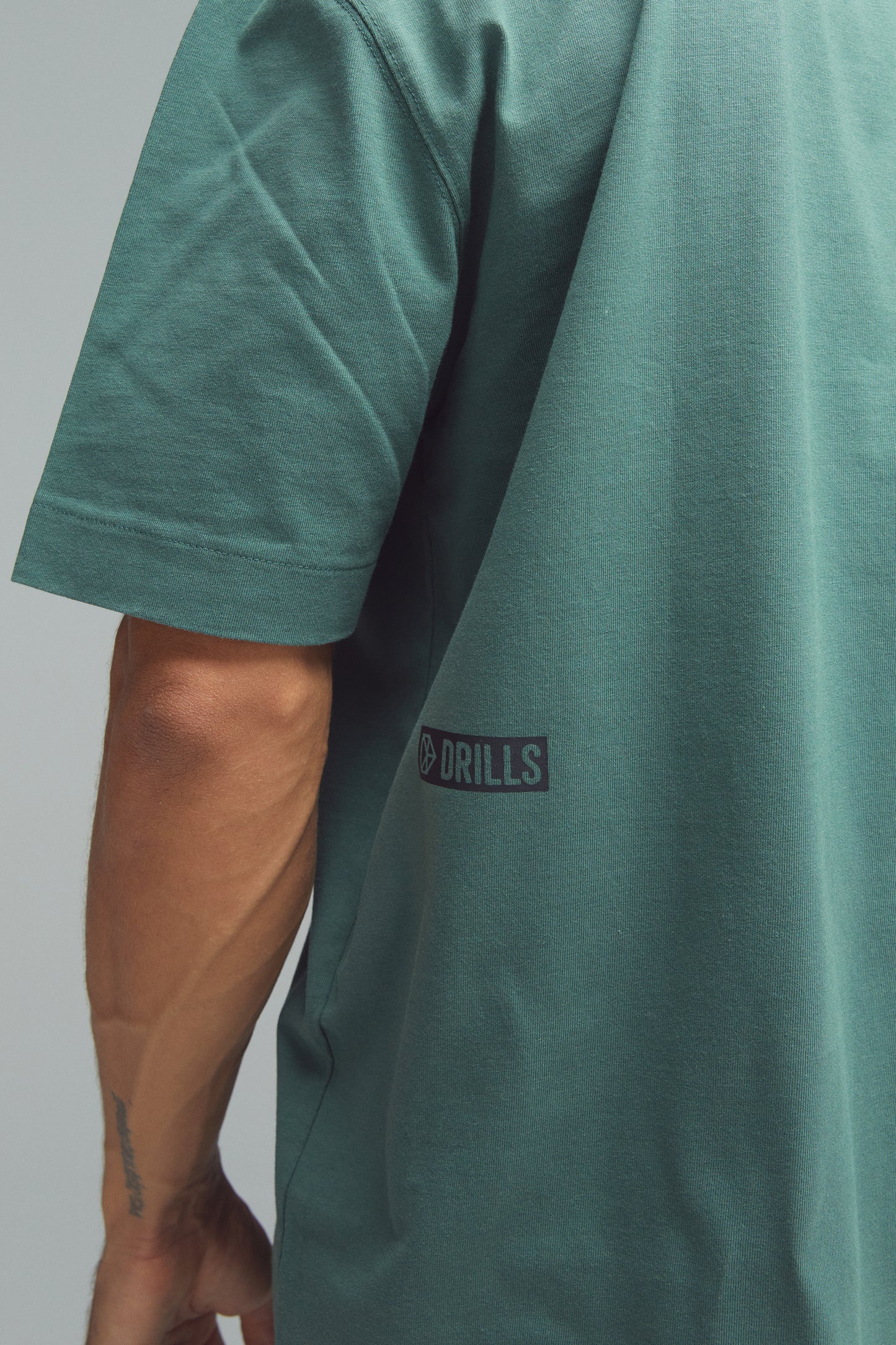 RECREATION DRILLS D-Logo Graphic Tee Dark Sage Green/Black