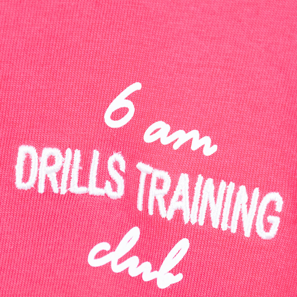 
                      
                        RECREATION DRILLS 6am Tee Raspberry / White
                      
                    