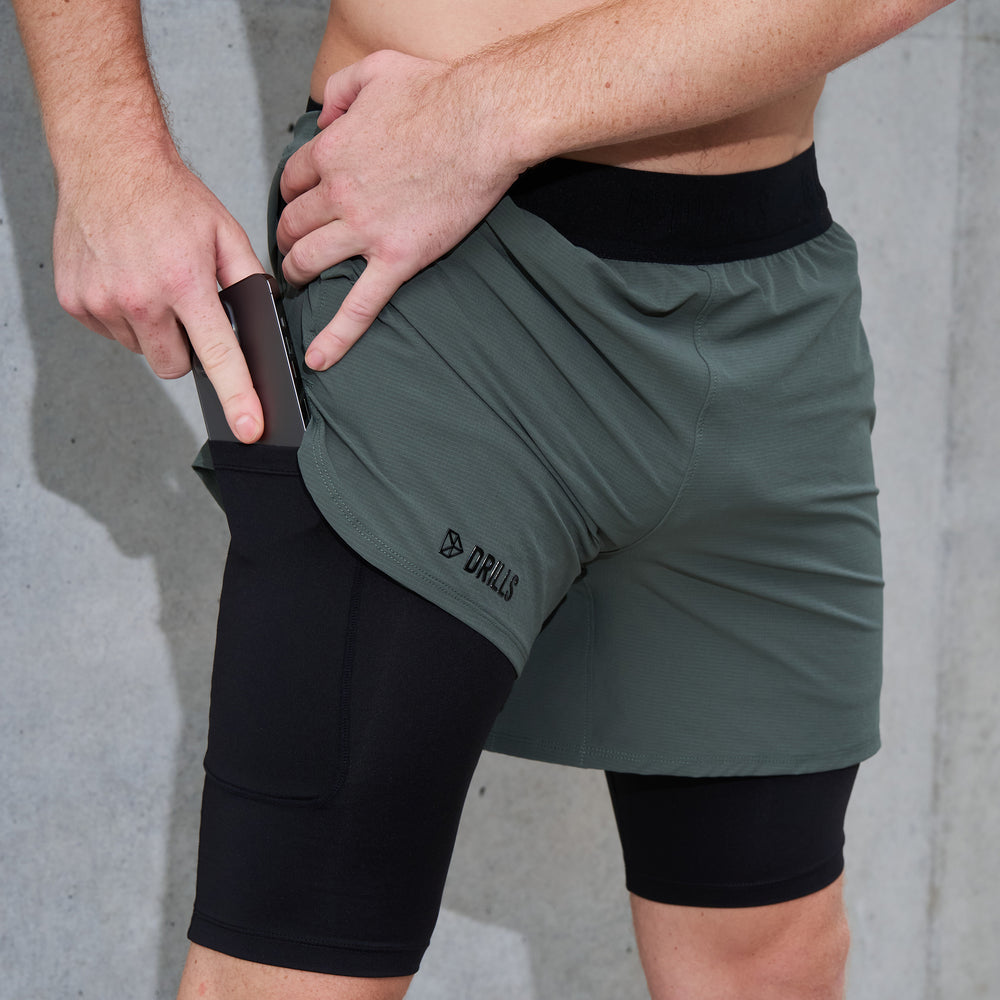 
                      
                        XFUNCTION DRILLS 2-in-1-Shorts Dark Sage Green
                      
                    