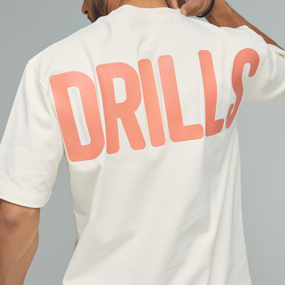 
                      
                        RECREATION DRILLS Bold Graphic Tee Whisper White/Sunset Glow
                      
                    